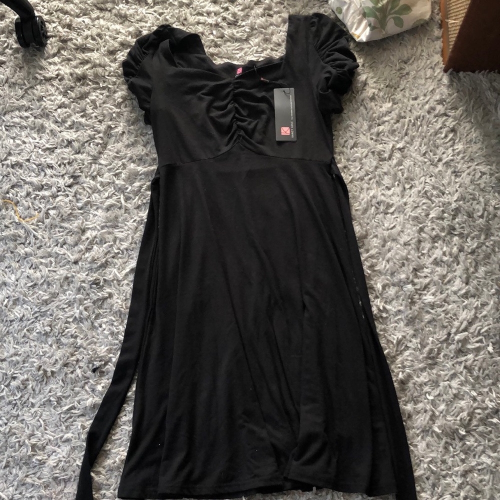 Kancy Kole mid-length dress.